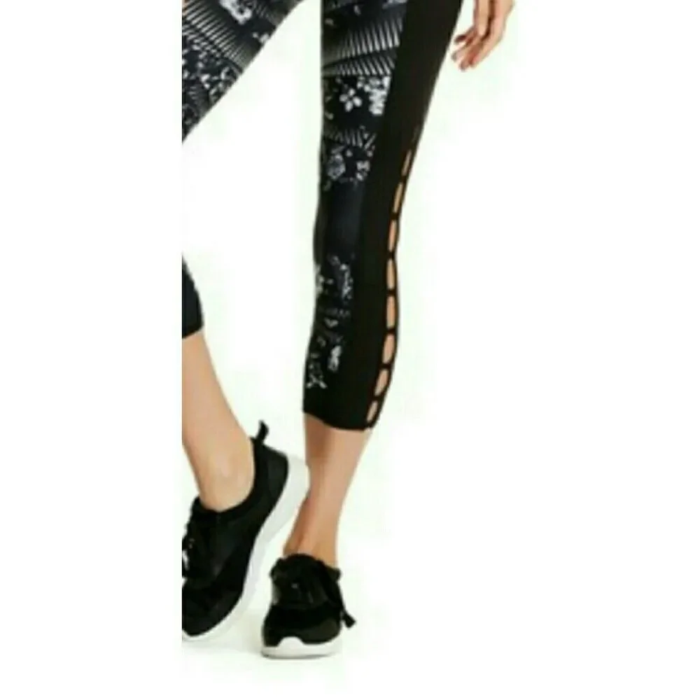 NWT Betsy Johnson floral cutout leggings. XS